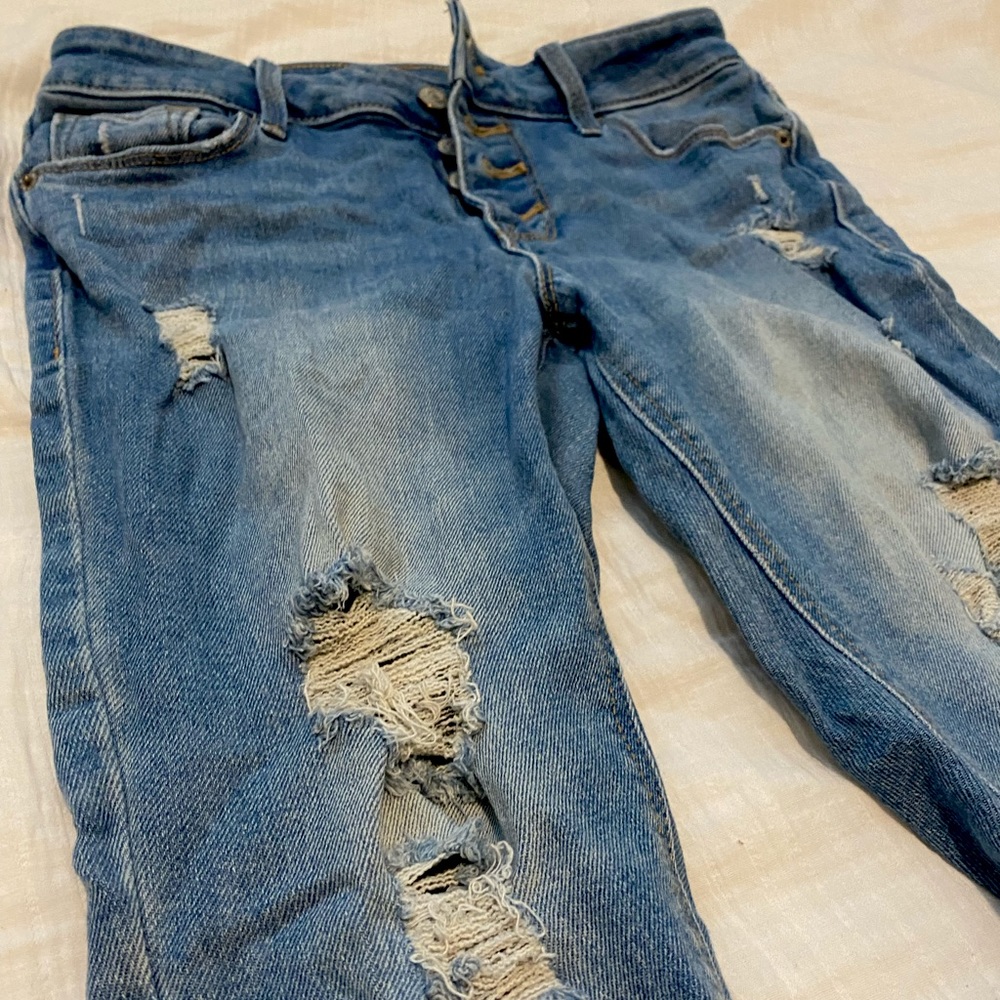 Old navy rockstar super skinny jeans. Size 0 mix/high waisted jeans.